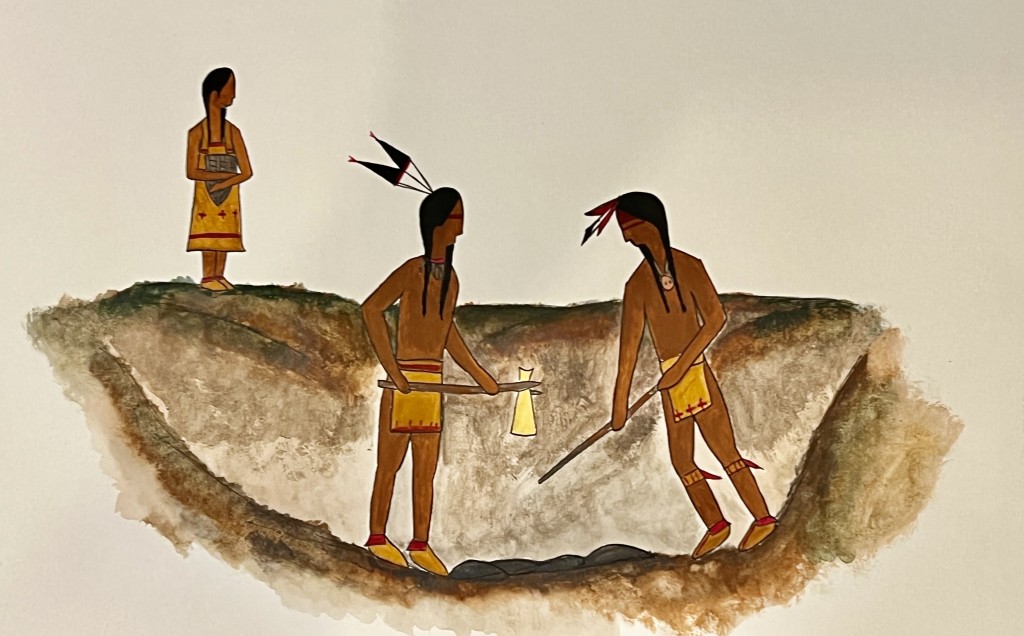 illustration with three Native Americans, two holding traditional tools they've used to dig a deep pit and the third standing on the bank of the pit watching.