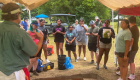 Chickasaw Nation archaeologist Brad Lieb, front left, talks with visiting Choctaw students as they tour the Chickasaw Explorers’ excavation units. Courtesy photo